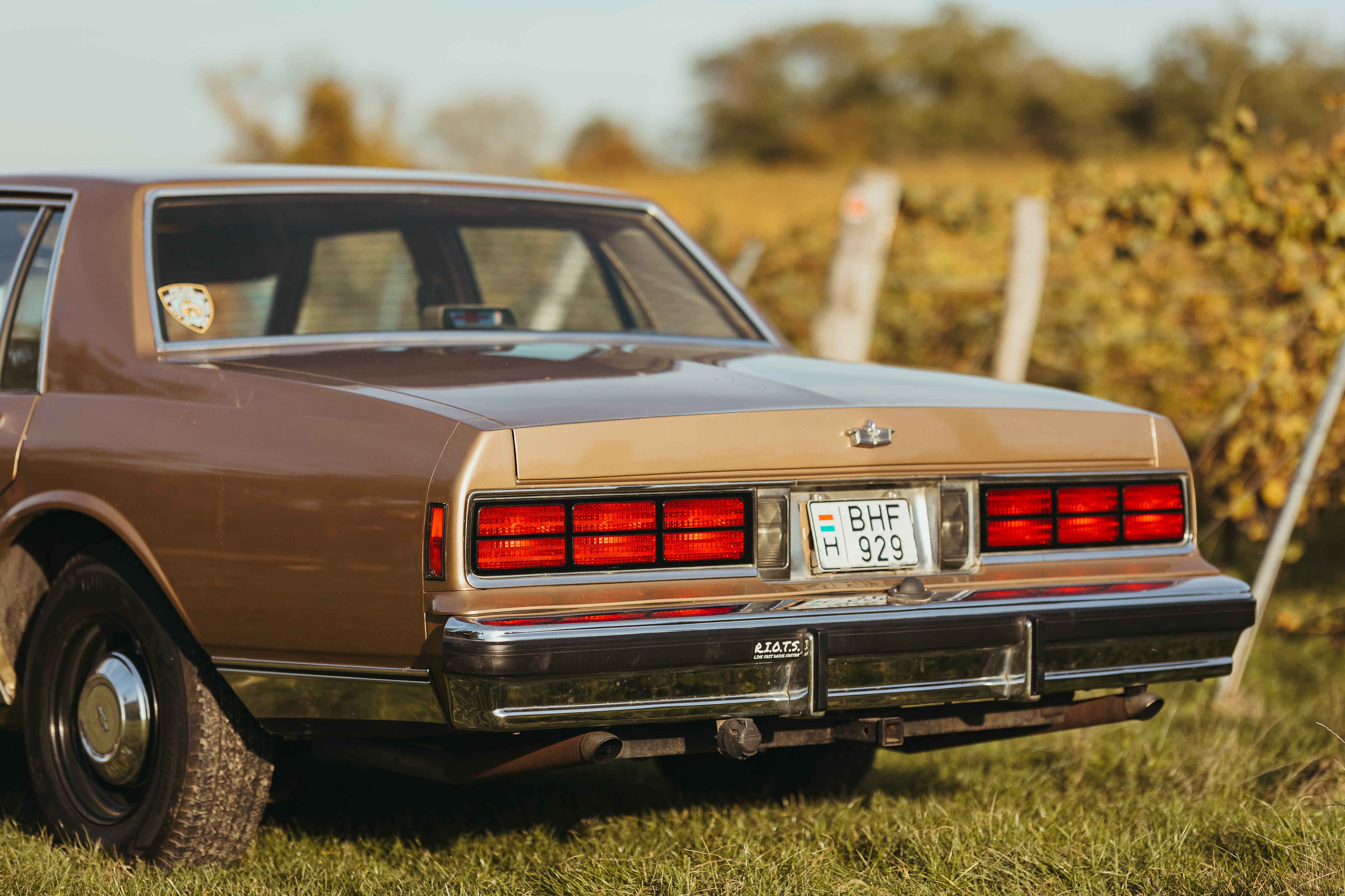 1986 Chevy Caprice Classic driving on a country road